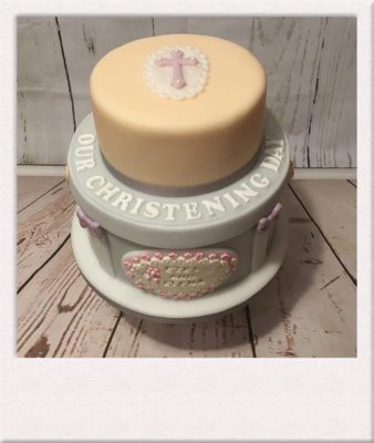 2 tier christening cake made by All Things Cake Epsom